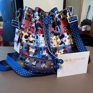 Harvey’s Disney Patchwork Parkhopper EUC.